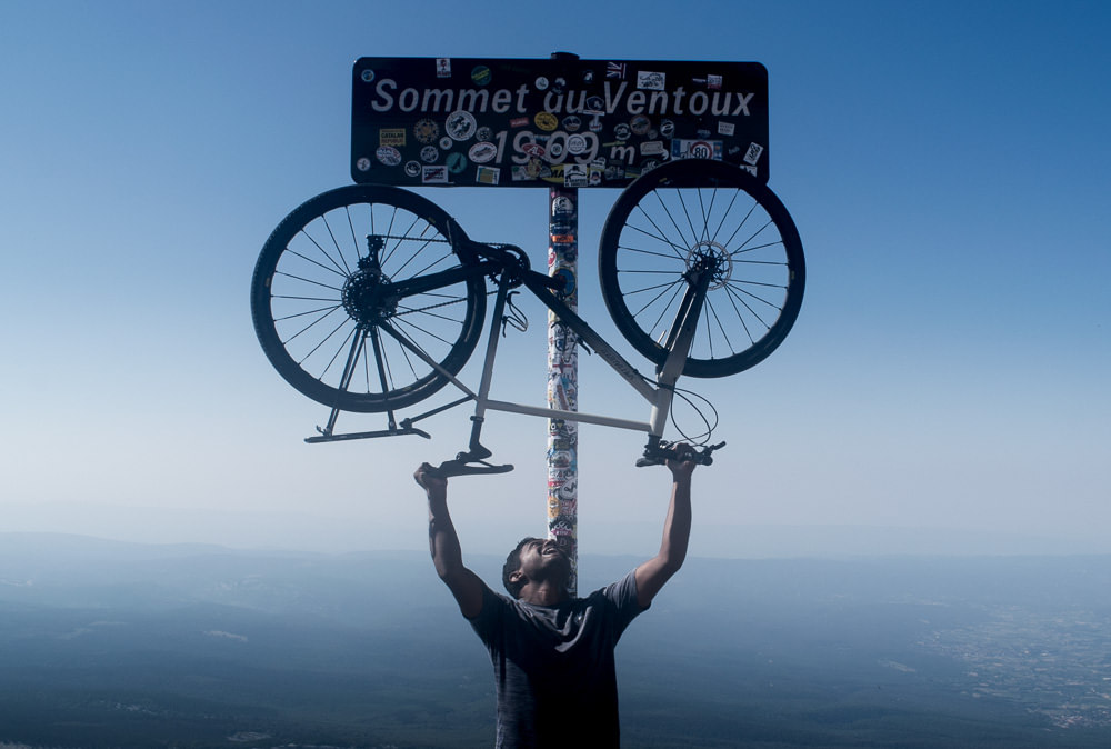 Me, my bike, and the iconic sign at the summit of Mount Ventoux