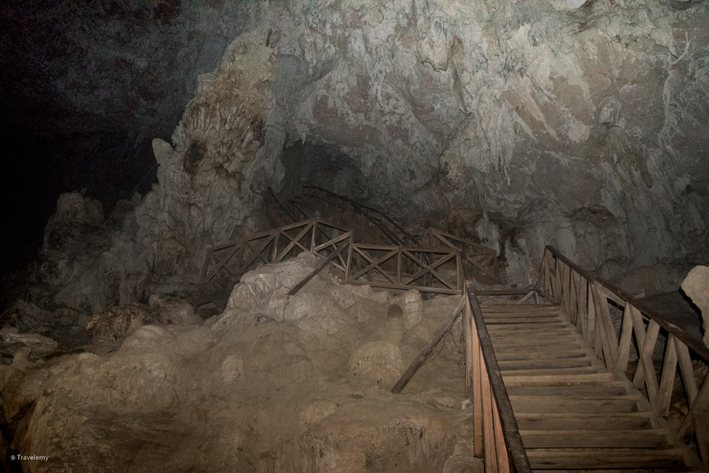 Steep wooden stairs take you to the second cave